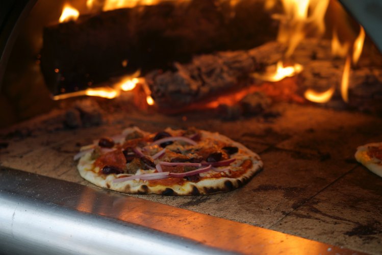 Boosting Telecompetence for The Rock - Wood Fired Pizza